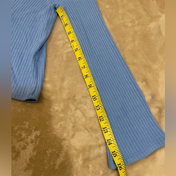 Reformation Gellar Button Front Long
Sleeve Ribbed Knit Top Parisian Blue. - Picture 4 of 15